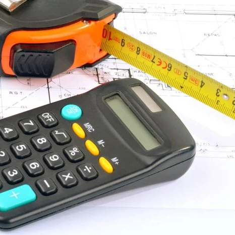 A calculator and measuring tape to estimate project costs