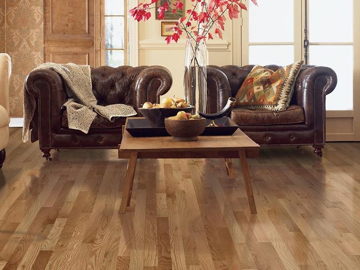 Hardwood flooring in a living room in West Suite F Clayton, NC area by by Clayton Flooring Center