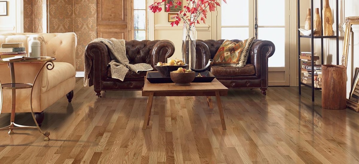 Hardwood flooring in a living room in West Suite F Clayton, NC area by by Clayton Flooring Center
